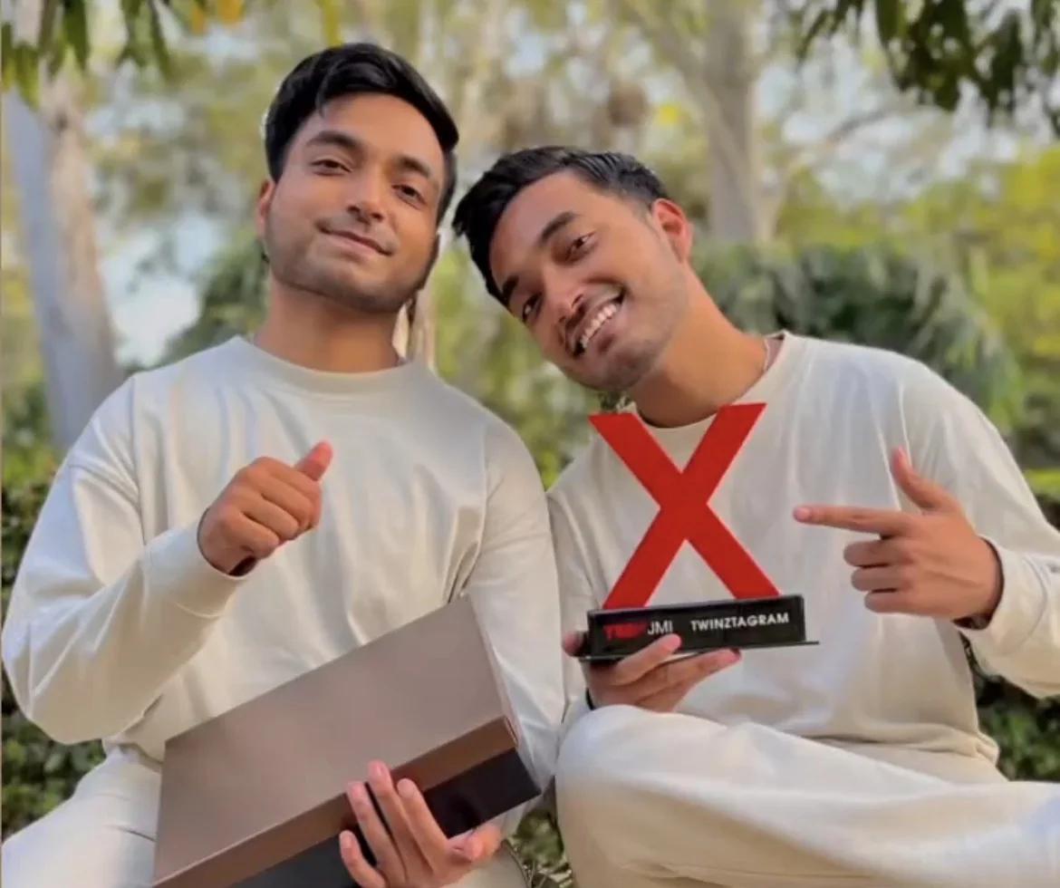 Aman Ahmad and Adil Ahmad with the TEDx award